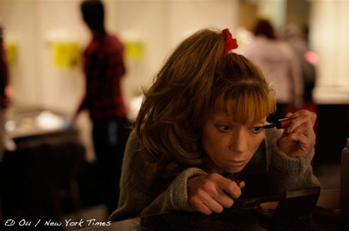 Ed Ou photographs woman doing makeup at Vancouver's Insite safe injection site 