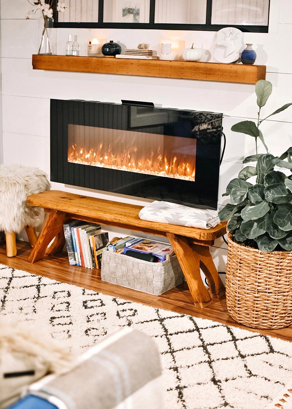 living room with fireplace and baskets