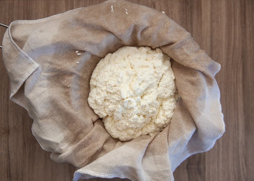 queso fresco in a cheese cloth